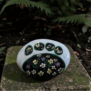 Hand crafted painted floral paw rock white background stone 3x2 inch approx